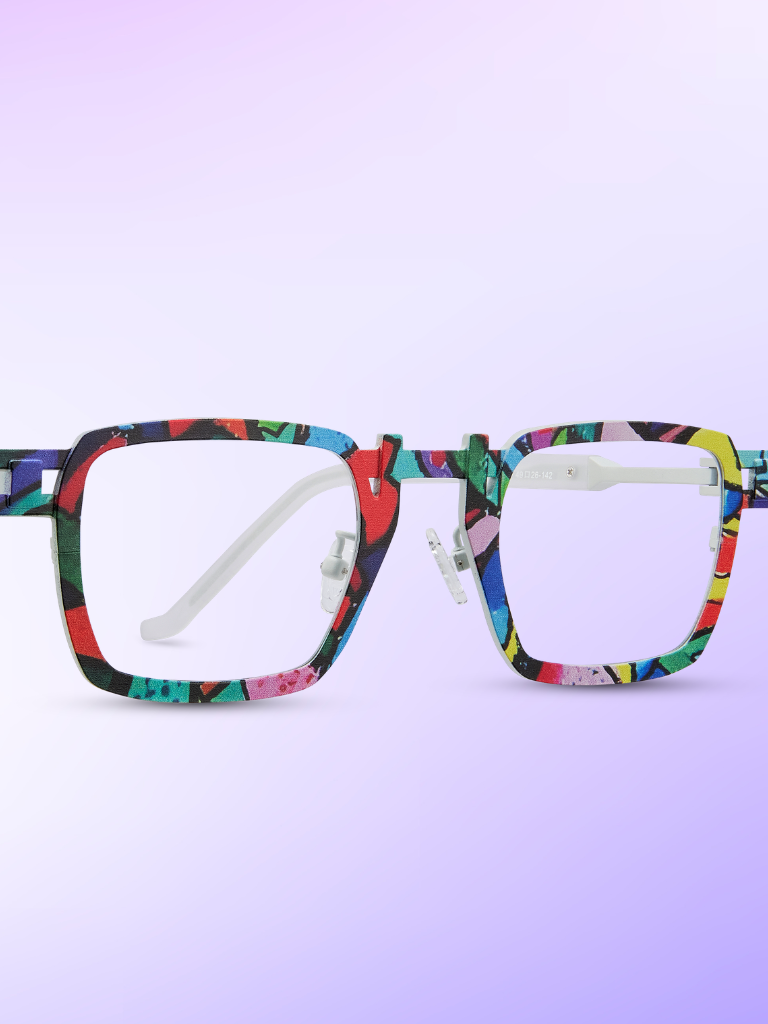 Colorful rectangular eyeglasses with a multicolored, geometric pattern on the frames, displayed on a purple gradient background.